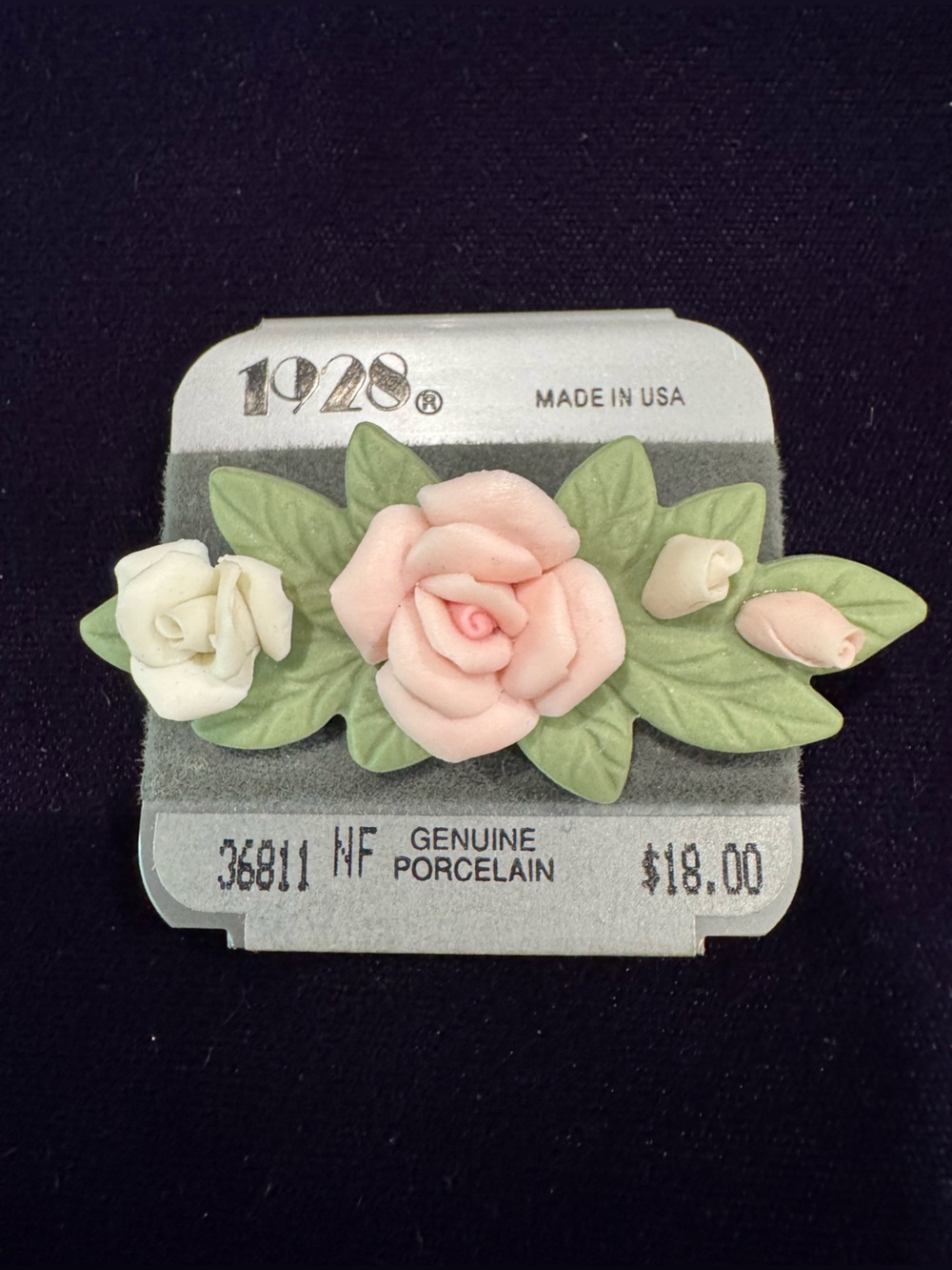 1928 Pale Pink and Cream Porcelain Rose Brooch with Green Leaves